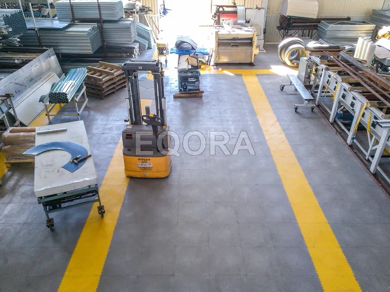 Резиновые покрытия из крошки для производственного цеха в Мегионе